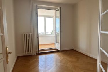 Appartement de charme de 4 pièces au 2ᵉ étage, offrant une véranda et une splendide vue sur le lac - env. 91m2